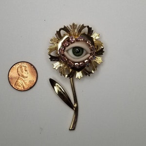 Fancy Flower Wink Gold toned vintage brooch glass doll eye. OOAK mixed media jewelry. Floral fantasy art. image 2