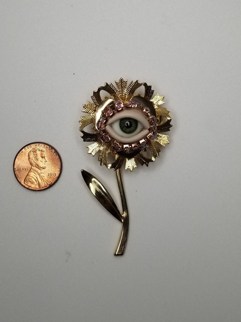 Fancy Flower Wink Gold toned vintage brooch glass doll eye. OOAK mixed media jewelry. Floral fantasy art. image 2