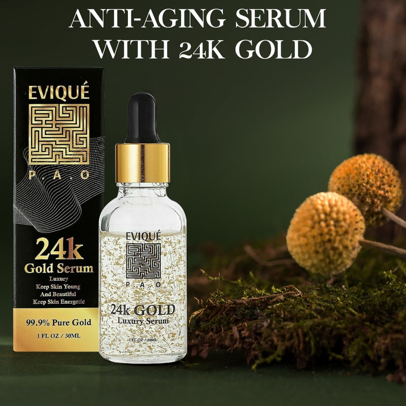 May include: A clear glass bottle with a gold cap and label. The bottle contains a gold serum with flecks of gold. The label reads "EVIQU&Eacute; 24k GOLD Luxury Serum 1 FL OZ / 30ML".