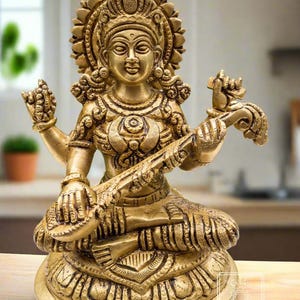 Sarasvati idol; Brass Sarasvati Goddess of wisdom Playing veena - 8&quot;