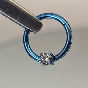 16g (1.2mm) Titanium Solitaire CZ Single Gem Hinge Hoop 5/16" (8mm) Diameter Anodized Ice Blue Finish in Photo *Choose Finish*