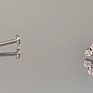 18g (1.0mm) Titanium Threadless Trinity Top Clear Gems CZ choice of 1/4" (6mm) or 5/16" (8mm) Length Flatback Post High Polish Silver Finish