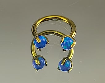 16g (1.2mm) Titanium Horseshoe Yellow Gold Circular Barbell w/3mm Blue Opal Claw Prong Setting Anodized Finish Septum