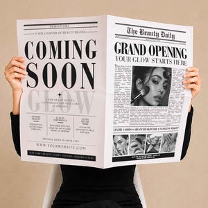 May include: A black and white newspaper titled The Beauty Daily featuring the headline Coming Soon Glow. The layout includes text about a grand opening, a black and white photograph of a face with makeup brushes, and smaller images of beauty services.