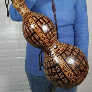 A gourd that can be used to hold water. Can be used as water bottle, water bottle. Unique, Mother&#39;s Day Gifts
