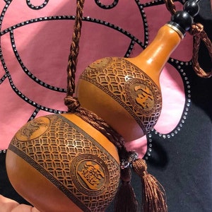 A gourd that can be used to hold water. Can be used as water bottle, water bottle. Unique, Mother&#39;s Day Gifts
