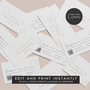 May include: A digital template for a business card featuring a minimalist design with a handwritten name, "Jessica Peterson Boutique", and a floral illustration. The template is customizable using Canva and includes a QR code and contact information.
