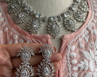 Necklace Sets - Assorted Tanvi, Delicate next to real American diamond necklace and earring sets.