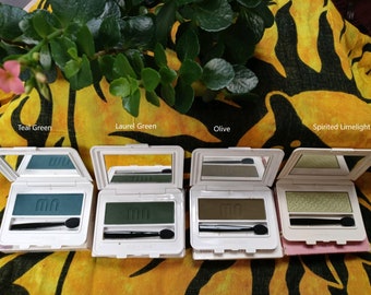 Merle Norman Cosmetics Luxiva Makeup Single Eye Shadow Compacts Pinks Blues Greens Greys Blacks Yellows