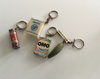 Lot de 4 porte-clés vintage gauloise cigaret, chicorée Leroux, omo, Parisot ancien collectionneur bon état