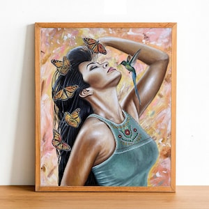 May include: A painting of a woman with long black hair adorned with butterflies. She is wearing a teal tank top with embroidered details and has her eyes closed. A hummingbird is flying near her face.