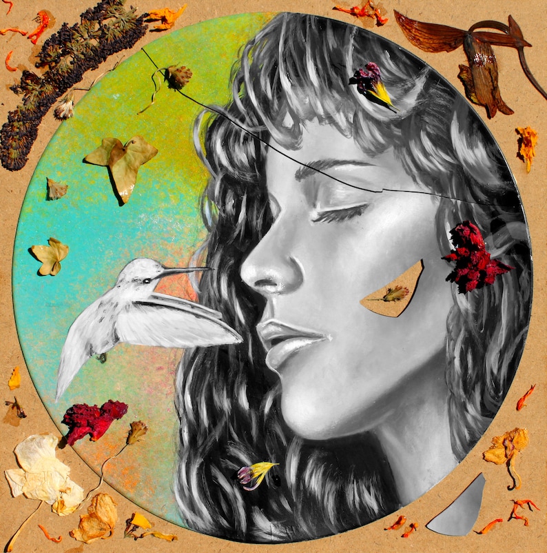 May include: A black and white painting of a woman with long hair, her eyes closed, and a hummingbird flying towards her. The background is a colourful abstract design with dried flowers and leaves.