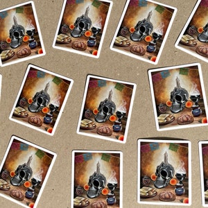 May include: A set of 10 stickers featuring a Day of the Dead altar with a sugar skull, candles, and offerings. The stickers are printed on white paper with a glossy finish.
