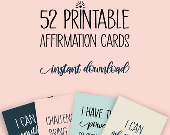 May include: A set of 52 printable affirmation cards, available as an instant download. The cards are in shades of navy, pink, teal, and cream, featuring motivational quotes in a handwritten style font. The text reads "52 Printable Affirmation Cards".