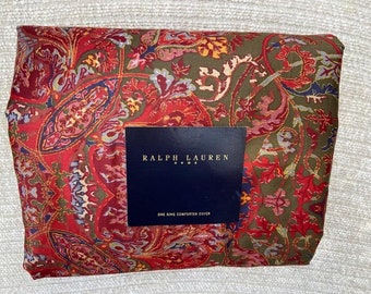 May include: A red, green, and blue paisley patterned king-size comforter cover with a Ralph Lauren Home label. The label reads "One King Comforter Cover".