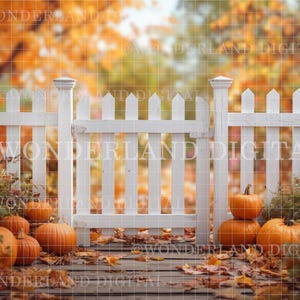 May include: A white picket fence with a gate, surrounded by pumpkins and fall foliage. The pumpkins are various sizes and shapes, with orange skin. Fallen leaves are scattered on the wooden walkway, creating a seasonal autumn scene.