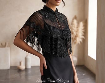 Capa nupcial negra con cuentas: ideal para bodas y eventos nocturnos.