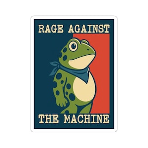 Op de afbeelding: Een sticker met een cartoonkikker met een blauwe bandana, groene huid en zwarte vlekken. De tekst "RAGE AGAINST THE MACHINE" wordt in witte blokletters weergegeven tegen een marineblauwe en rode achtergrond.