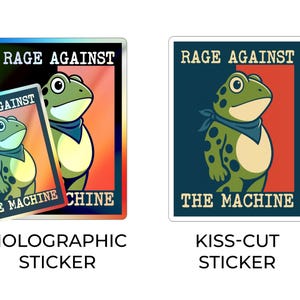 Op de afbeelding: Twee stickers met een cartoon kikker ontwerp en de tekst "RAGE AGAINST THE MACHINE". E&eacute;n is holografisch, de andere een kiss-cut sticker. De kikker is groen met een blauwe bandana.