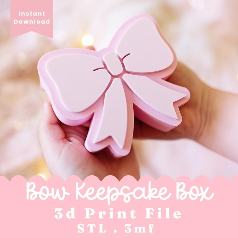 May include: A light pink keepsake box shaped like a bow with a removable lid. The text on the image reads Instant Download, Bow Keepsake Box, 3d Print File, STL . 3mf. The object features a smooth surface and a layered, dimensional design.