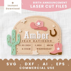 May include: A wooden arch-shaped birth announcement sign featuring a laser-cut design with a light green cactus, a pink cowboy hat, a brown horseshoe, and a pink cowboy boot. The text reads Amber, Jean Davidson, 21.02.2024, 3.0KG, 48CM, 6:35AM, Wednesday.