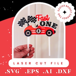 May include: A red race car cake topper with the words "Fast One" and checkered flags. The car has black wheels and the number "1". The topper is on a white stick. The image also includes the text "Laser Cut File" and file type extensions.