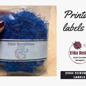 May include: Printable labels for dish scrubbies. The label says "Dish Scrubbies Reusable" and features a hand washing a dish. The label is in a clear plastic bag with a blue scrubbie inside.
