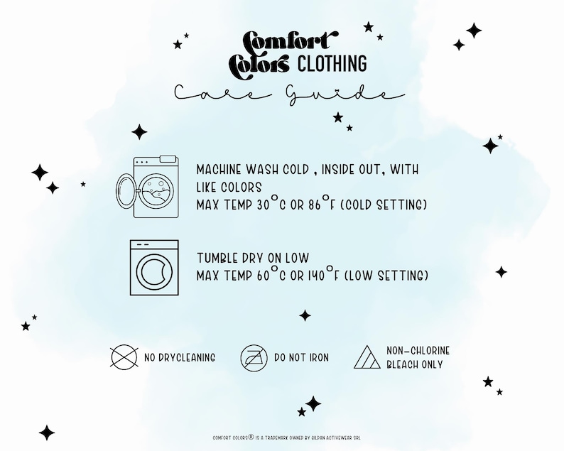 May include: A Comfort Colors Clothing care guide featuring black text and icons on a light blue watercolor background with stars. Instructions include machine wash cold at 86&deg;F, tumble dry on low at 140&deg;F, no dry cleaning, no ironing, and non-chlorine bleach only.