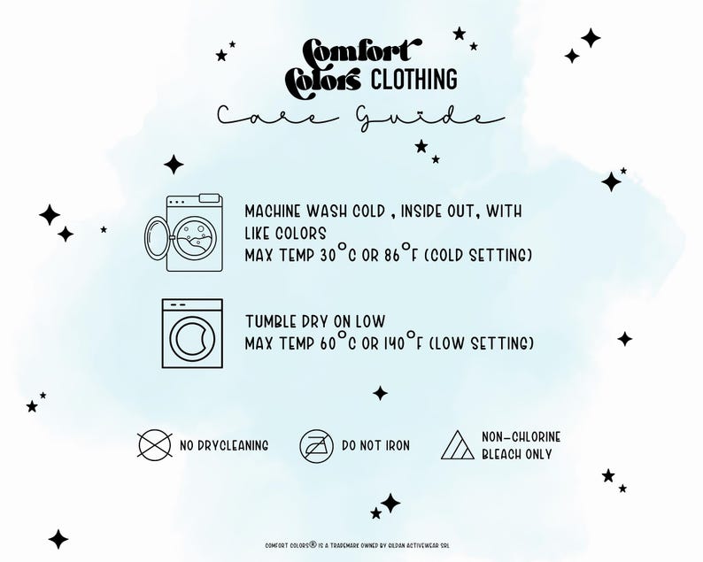 May include: A Comfort Colors Clothing care guide featuring black text and icons on a light blue background with star accents. Instructions include machine wash cold inside out, tumble dry on low, no dry cleaning, do not iron, and non-chlorine bleach only.
