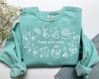 Sweat-shirt Hoppy infirmière MICU, chemise d'infirmière MICU de Pâques couleurs confort T-shirt pour unité de soins intensifs médicaux, cadeau de remise des diplômes d'infirmière autorisée