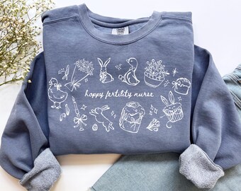 Hoppy Fruchtbarkeits-Krankenschwester-Sweatshirt, Komfortfarben Ostern Fruchtbarkeit RN-Shirt Geburtshilfe-Krankenschwester-T-Shirt, IVF-Reproduktions-ob-Krankenschwester-Abschlussgeschenk