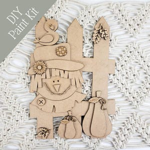 Kit de espantapájaros y valla para hacer un cartel de otoño / Kit de manualidades de madera sin terminar con calabazas, calabacines y pájaros / Proyecto de decoración otoñal