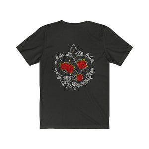 May include: Black t-shirt featuring a white graphic of a snake entwined with roses and celestial elements.