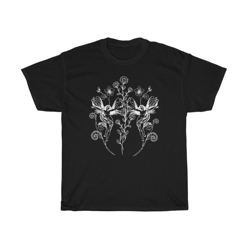 May include: Black t-shirt featuring a white graphic of two fairies with floral elements. The design is symmetrical, with the fairies facing each other amidst flowers and vines. The shirt is made of a soft, comfortable material.