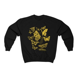 May include: Black sweatshirt with a gold design of various butterflies and caterpillars.