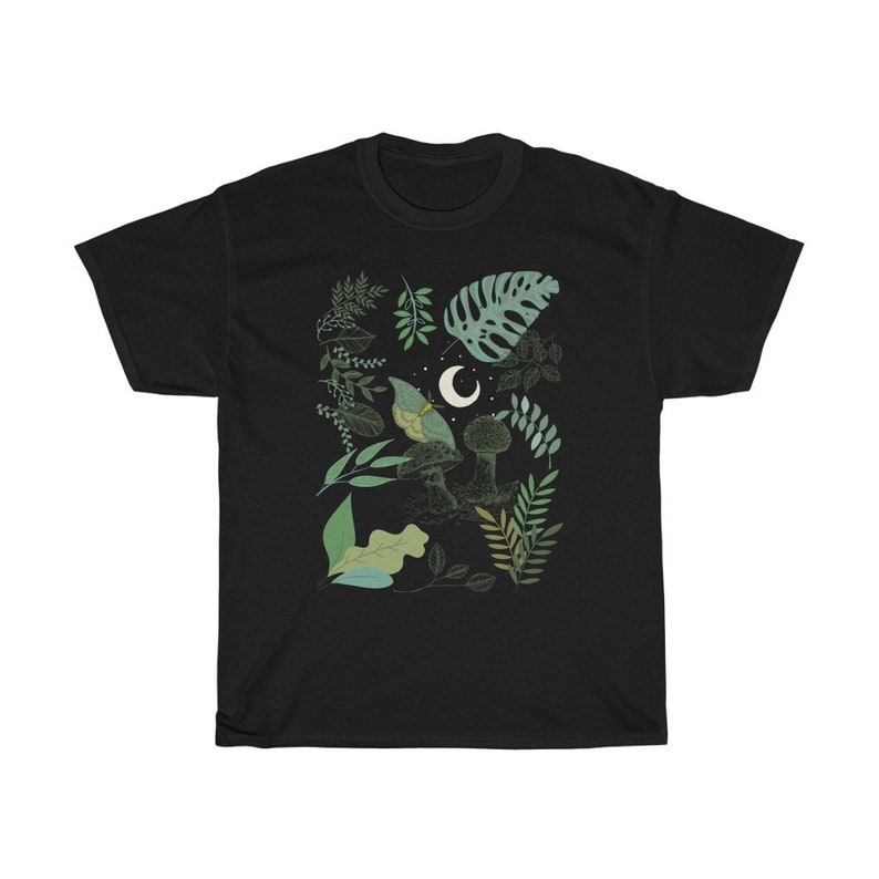 May include: Black t-shirt with a green and white illustration of a mushroom, leaves, and a crescent moon.