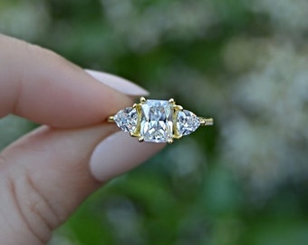 Jennyfer: Radiant Cut with Trillion Side Stones Engagement Ring - CZ & Sterling Silver