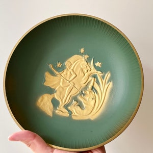 Decorative Scandinavian Art Deco, footed metal bowl Stjärnmetall Sweden with horseman and lion relief,Norse Mythology Swedish Design. 1930s.