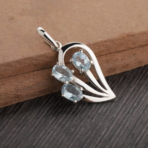 Colgante de topacio azul en plata de ley - Collar con piedra de nacimiento de marzo - Colgante de piedra ovalada - Collar con medallón de topacio azul hecho a mano