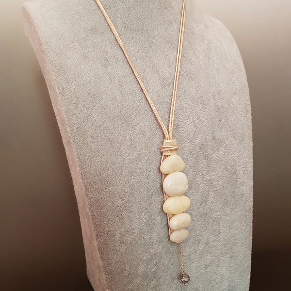 Long necklace with design stone pendant