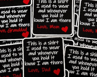 May include: A collection of square black fabric patches with white embroidered text that reads: This is a shirt I used to wear and whenever you hold it know I am there. Each patch includes a red embroidered heart and a signature like Love, Mom or Dad.