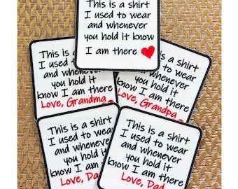 May include: Five white fabric patches with black text and a red heart. The text reads "This is a shirt I used to wear and whenever you hold it know I am there" followed by "Love, Grandma", "Love, Grandpa", "Love, Dad", and "Love, Da".