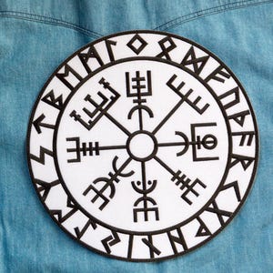 May include: A set of three ceramic mugs with a speckled, matte finish. Each mug features a different color: light blue, cream, and gray. The mugs have a simple, modern design with a rounded shape and a comfortable handle.