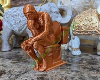 The Thinker , on the Toilet