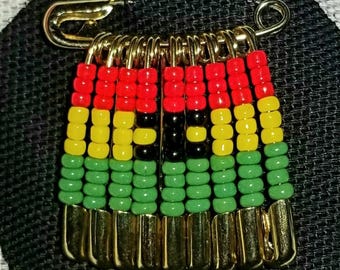 Ghanese vlagspeld (goud)