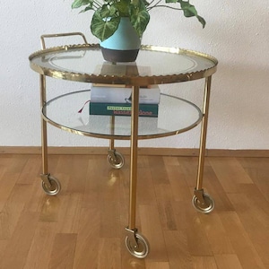 Brass bar cart from the 1950s by the Vereinigte Werkstätten Munich.