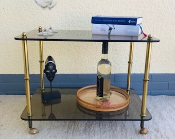 Very beautiful, filigree, gold-plated serving trolley from the 70s made of brass and smoked glass.