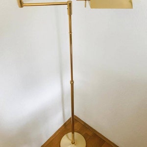 A very beautiful mid-century floor lamp / banker&#39;s lamp made of brass from the 70s.