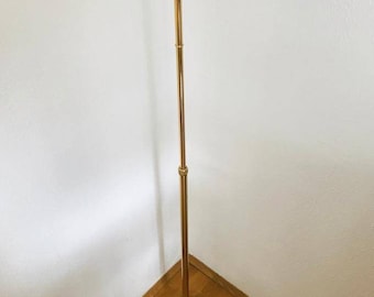 A very beautiful mid-century floor lamp / banker's lamp made of brass from the 70s.