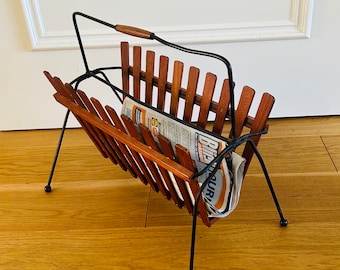 Magazine rack from the 70s made of metal and teak in string still.